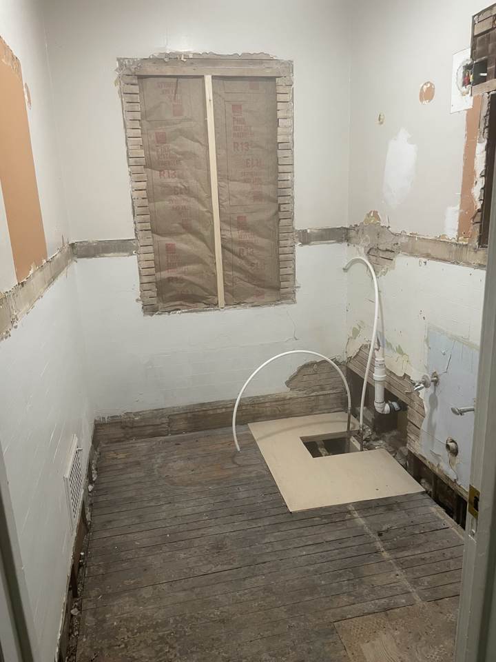 Bathroom stripped to the studs and subfloor for a remodel