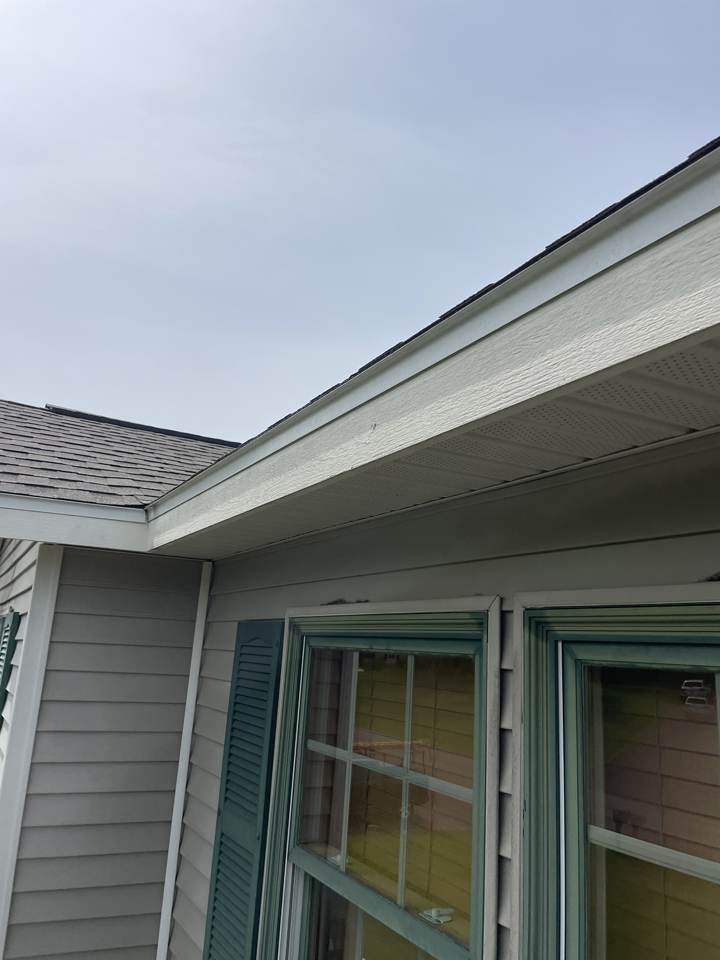 New fascia and vented soffit installed along a roofline